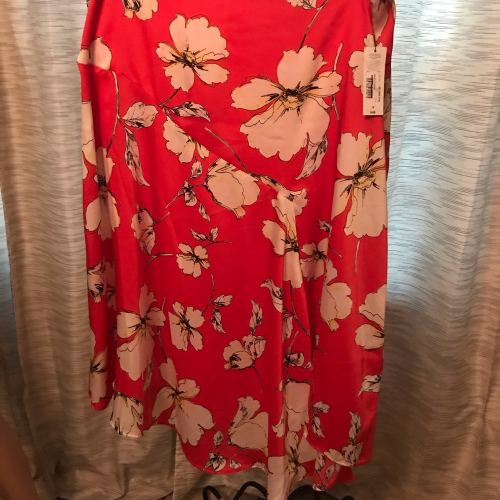 Red skirt with white flowers